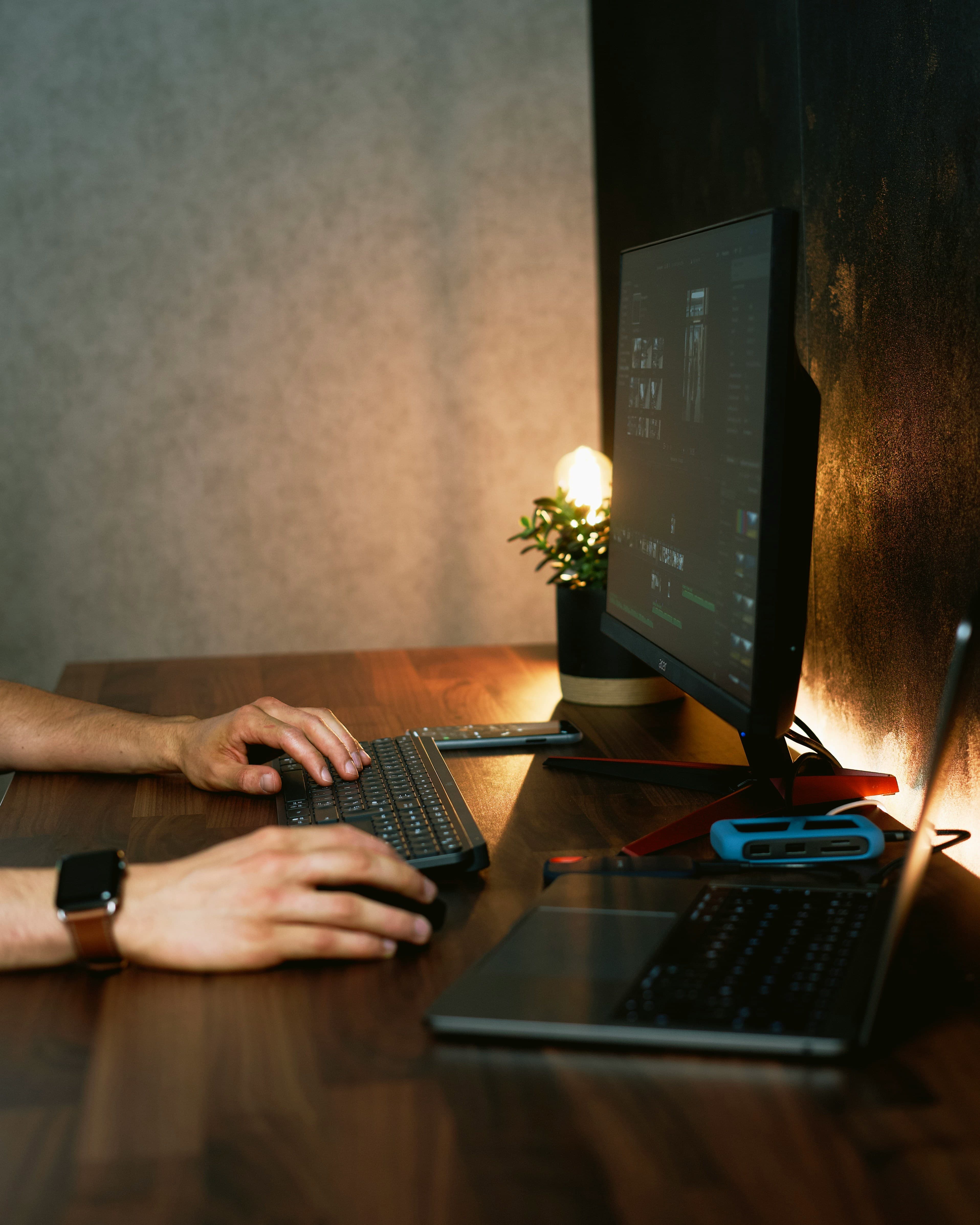 Picture of a warm and comfy studio, with warm lighting and a 'keep calm' text in a picture.